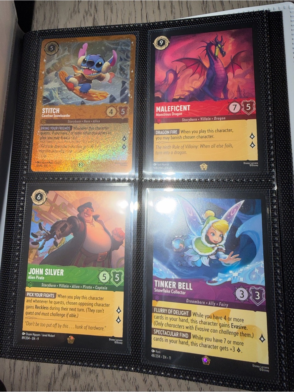 Stitch Lorcana Card Binder with cards.